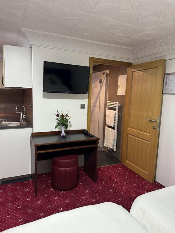 Kuchyň nebo kuchyňský kout v ubytování Hotel Eikenhof