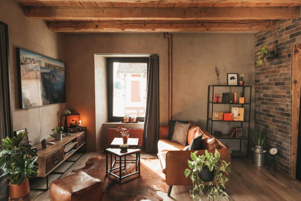 Posezení v ubytování Appartement thématique: Voyage Industriel