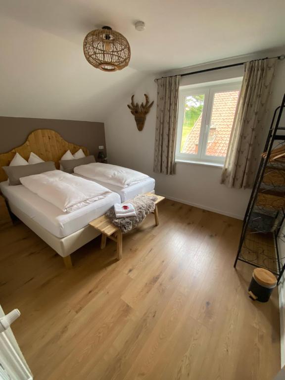 Postel nebo postele na pokoji v ubytování Haus Alpentraum