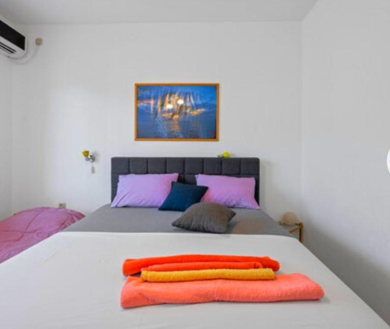 Postel nebo postele na pokoji v ubytování Apartman Arija-Pino