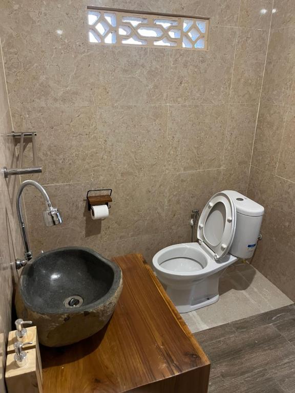Koupelna v ubytování Ananda House