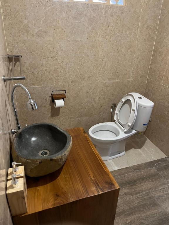 Koupelna v ubytování Ananda House