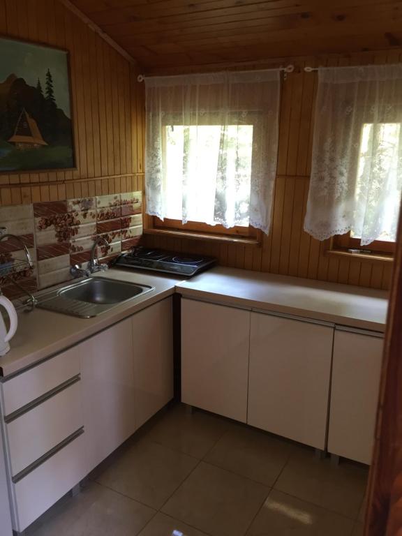 Kuchyňa alebo kuchynka v ubytovaní Ośrodek Wczasowy WARMA