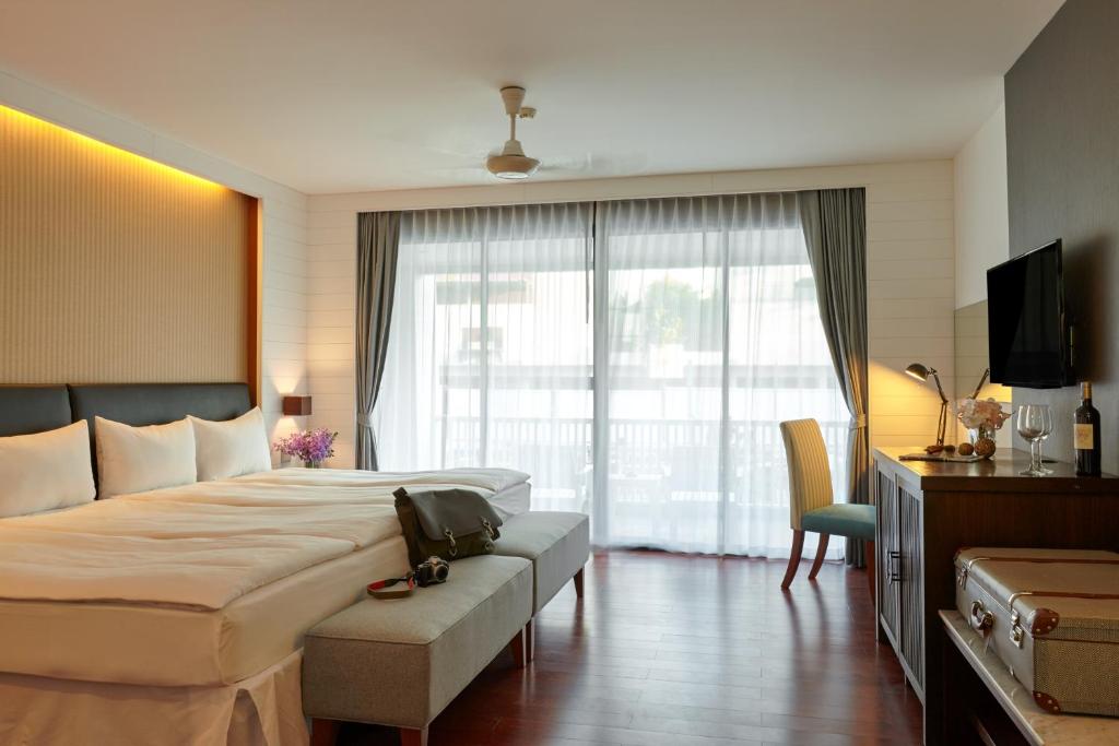 Postel nebo postele na pokoji v ubytování Loligo Resort Hua Hin