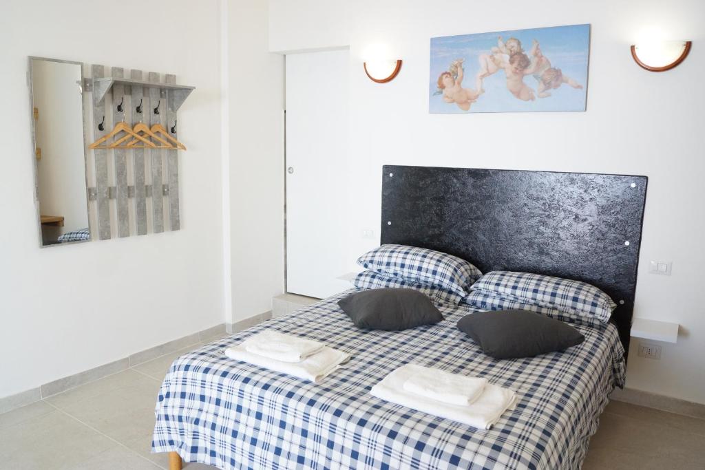 Posteľ alebo postele v izbe v ubytovaní Total sea View Grimaldi
