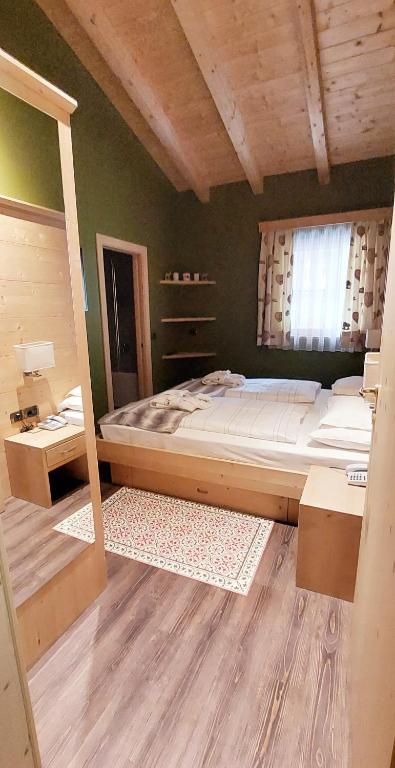 Postel nebo postele na pokoji v ubytování Hotel Somont
