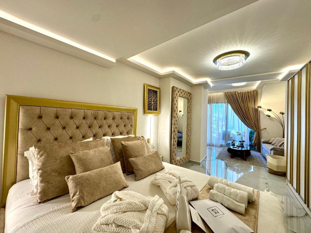 Postel nebo postele na pokoji v ubytování mare suites 4