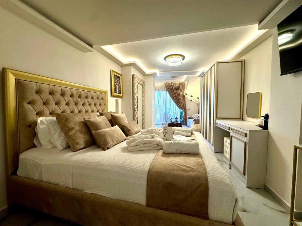 Postel nebo postele na pokoji v ubytování mare suites 4