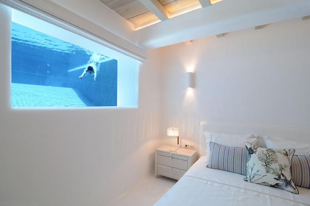 A bed or beds in a room at Bluebird Villas Villa Seabird