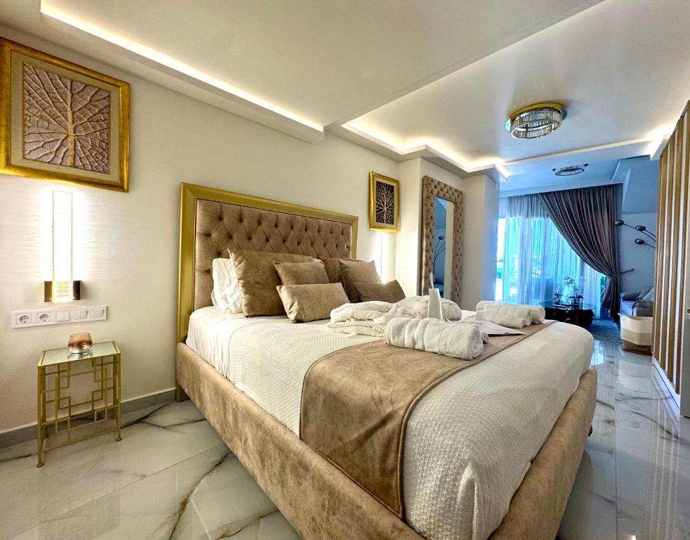 Postel nebo postele na pokoji v ubytování mare suites 4