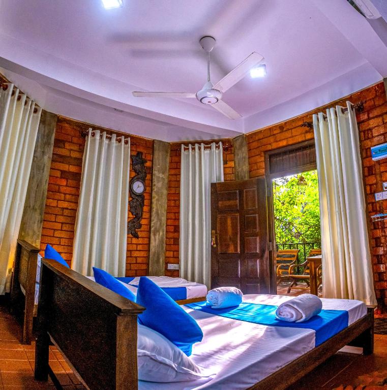 Postel nebo postele na pokoji v ubytování JayS Place Matale
