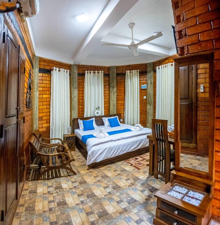 Postel nebo postele na pokoji v ubytování JayS Place Matale