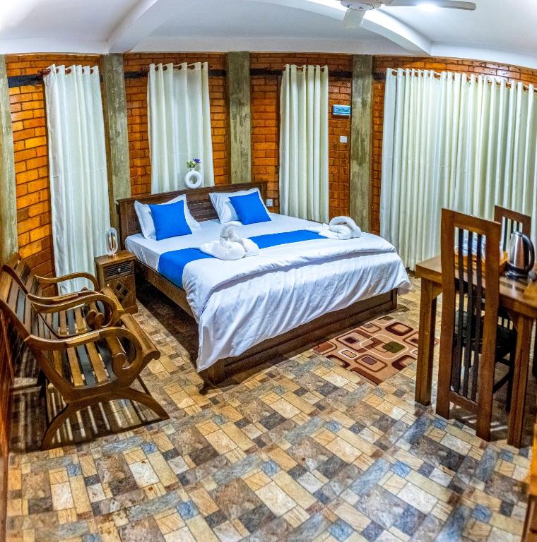 Postel nebo postele na pokoji v ubytování JayS Place Matale