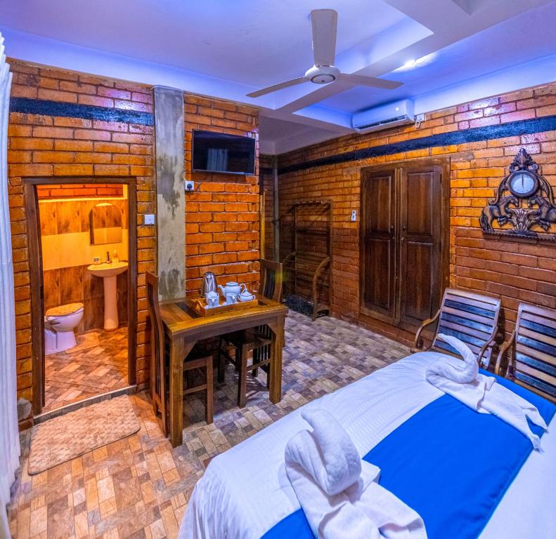 Postel nebo postele na pokoji v ubytování JayS Place Matale