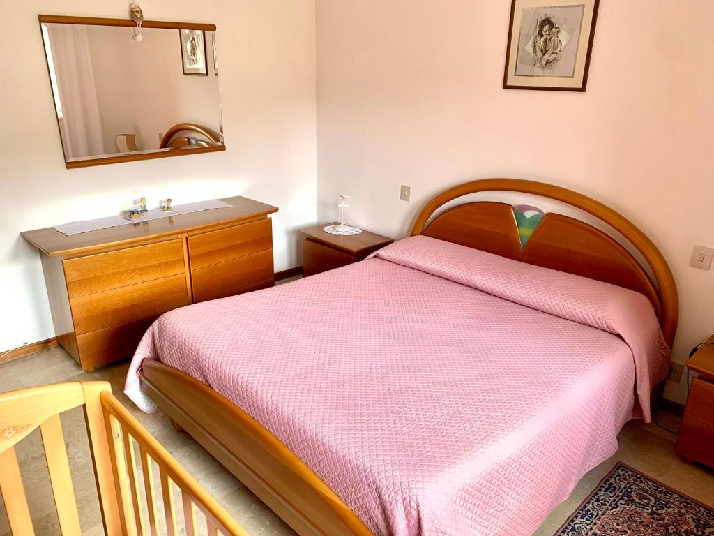 Postel nebo postele na pokoji v ubytování Appartamento da Cristina