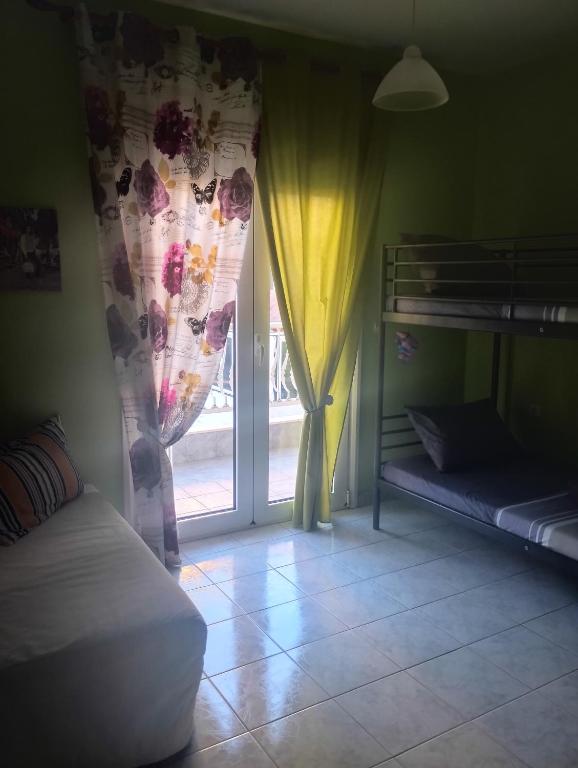 Postel nebo postele na pokoji v ubytování zoi apartment