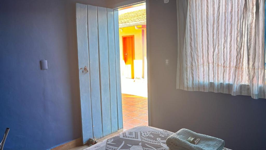Cama ou camas em um quarto em Vila Santê