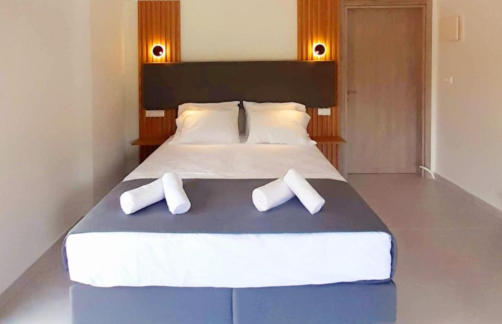 Postel nebo postele na pokoji v ubytování ACTA Luxury Rooms