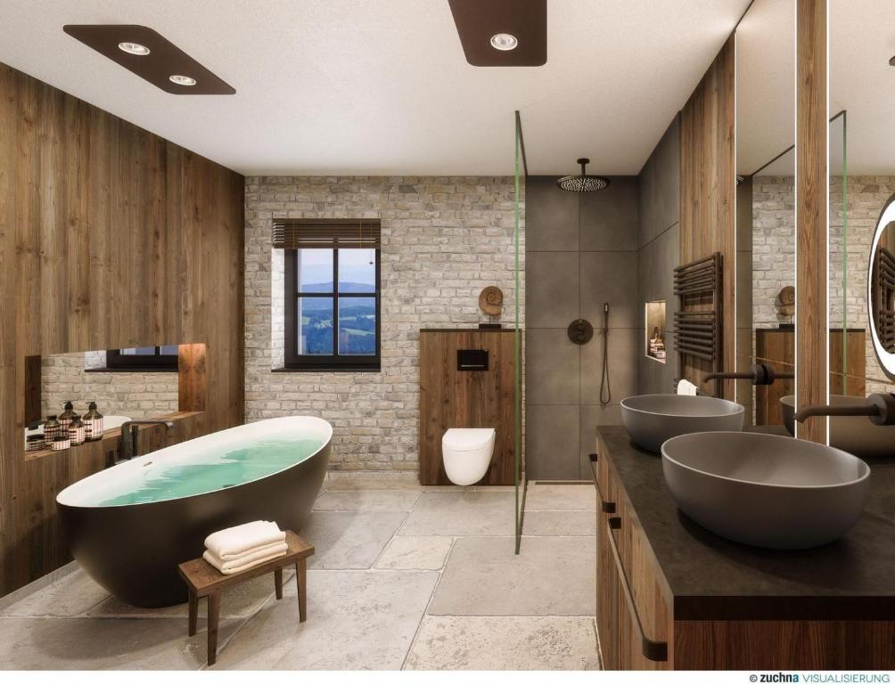 Kúpeľňa v ubytovaní Tomtegl-Bergchalet-No-7-mit-Privatsauna-Infinitypool-Kamin-Fitnessraum-1500m-Seehoehe