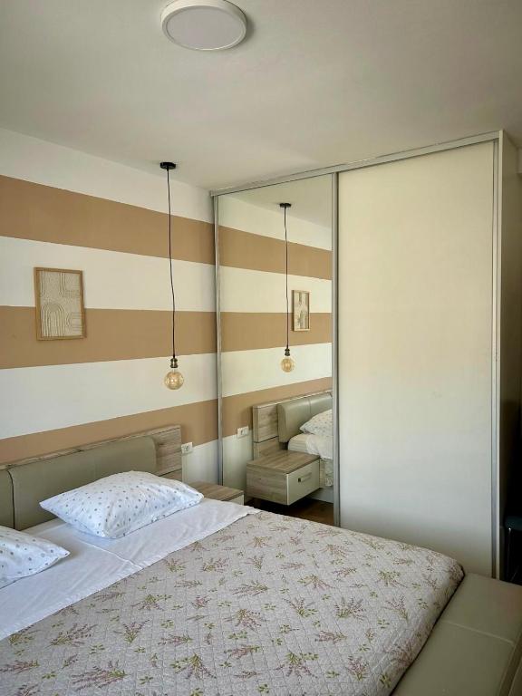 Postel nebo postele na pokoji v ubytování Apartment near sea ,,Brale'' - Galešnica