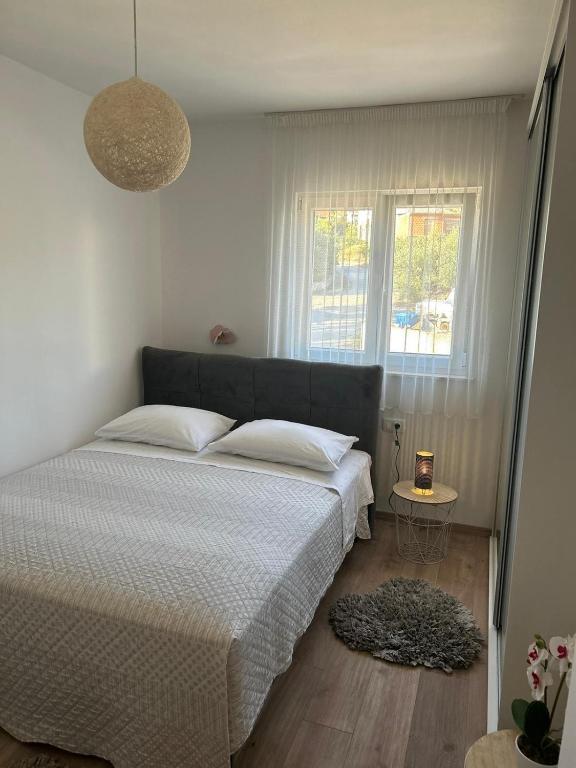 Postel nebo postele na pokoji v ubytování Apartment near sea ,,Brale'' - Galešnica