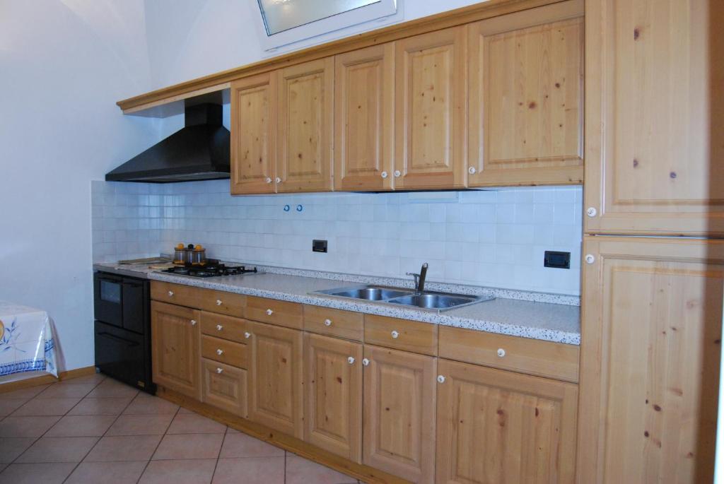 Kuchyň nebo kuchyňský kout v ubytování Residenza Arnica