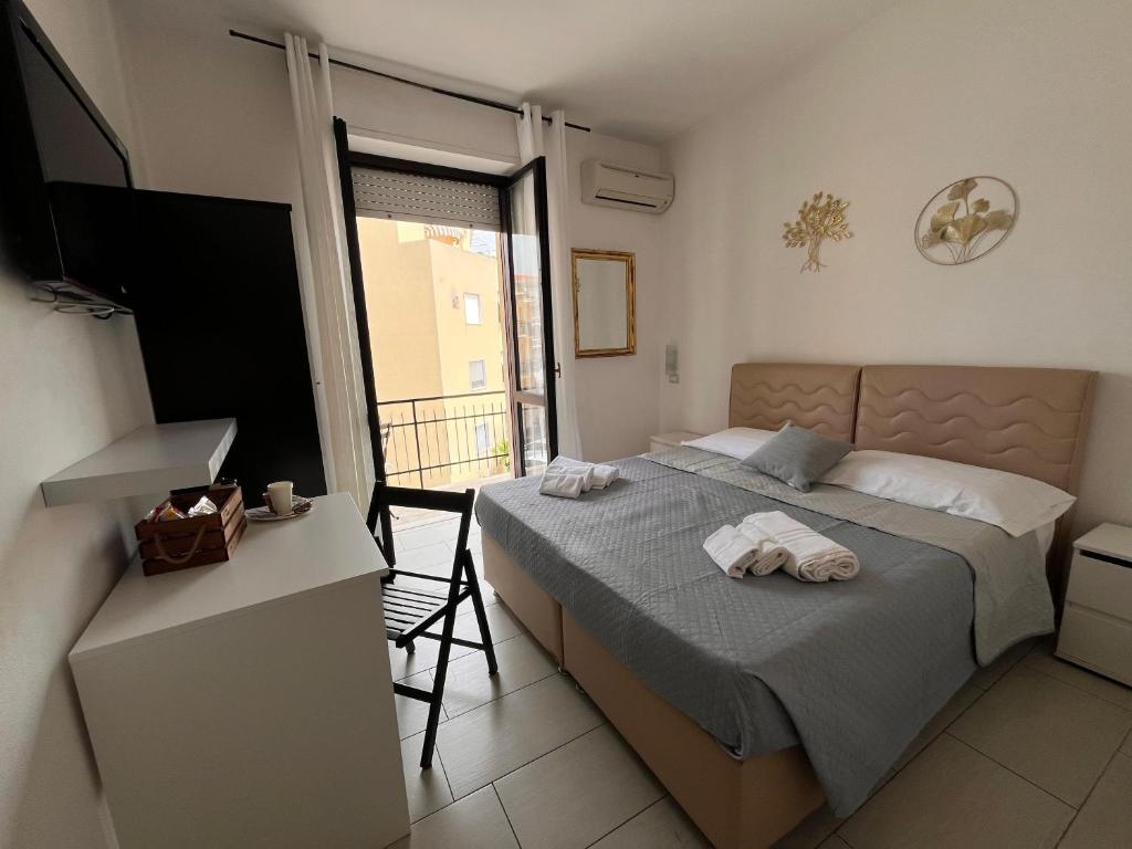 Postel nebo postele na pokoji v ubytování Eulalia Bnb Alghero