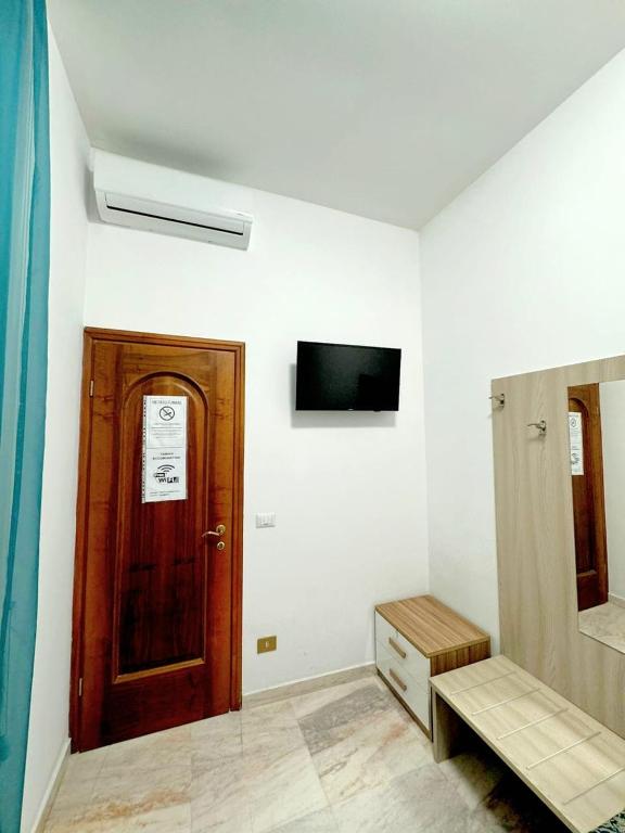 Telewizja i/lub zestaw kina domowego w obiekcie Tawhid Accomodation