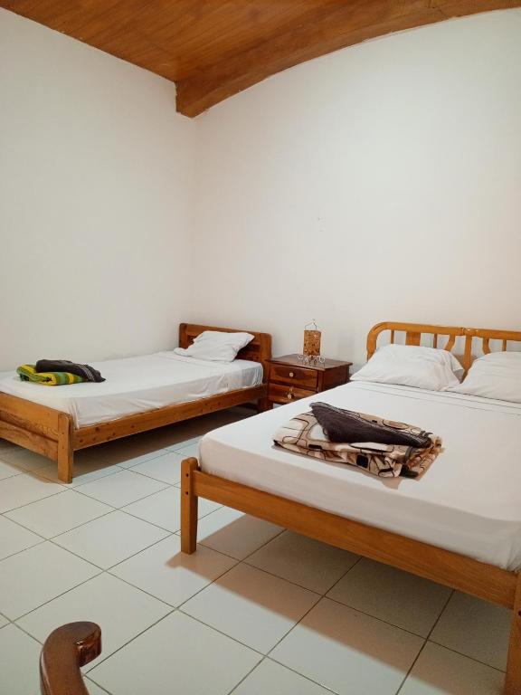 Postel nebo postele na pokoji v ubytování Bed and Breakfast Puerto López