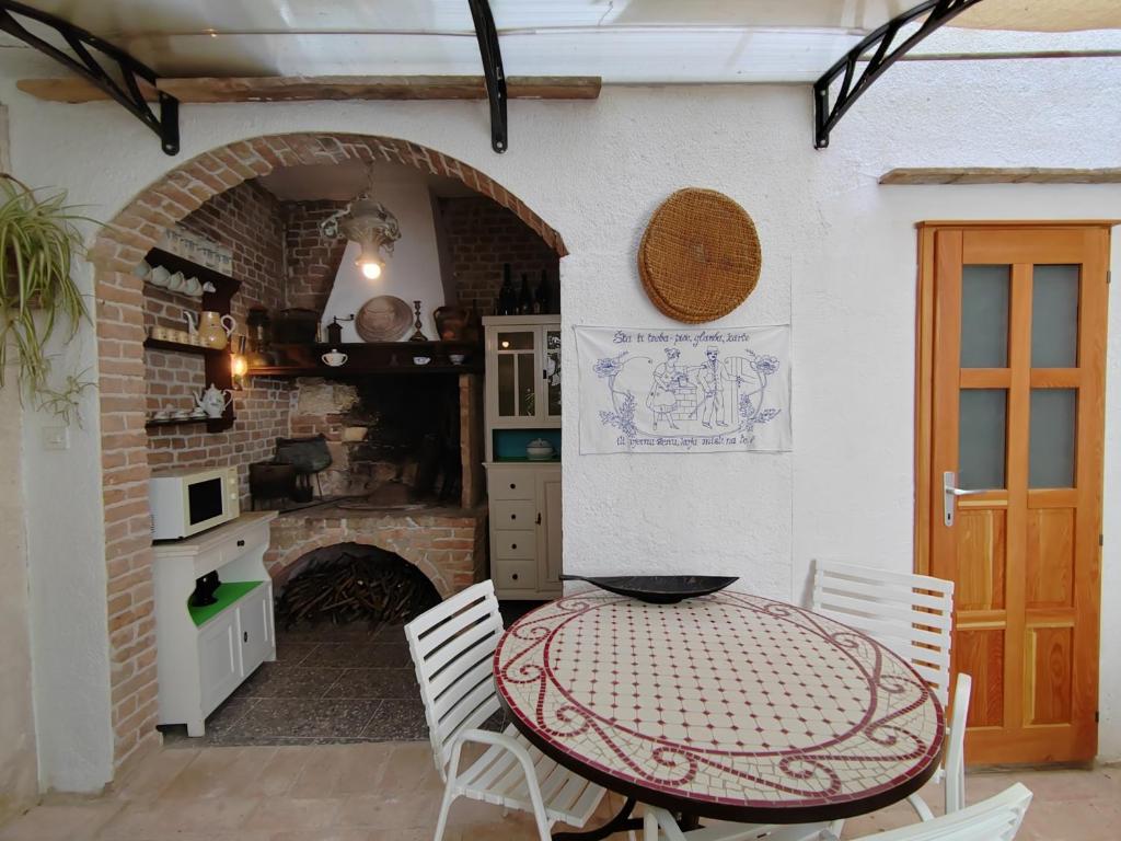 Kuchyň nebo kuchyňský kout v ubytování Apartments Lena