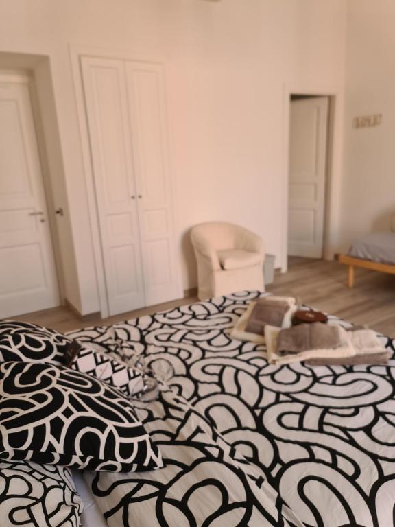 Postel nebo postele na pokoji v ubytování Filiberto