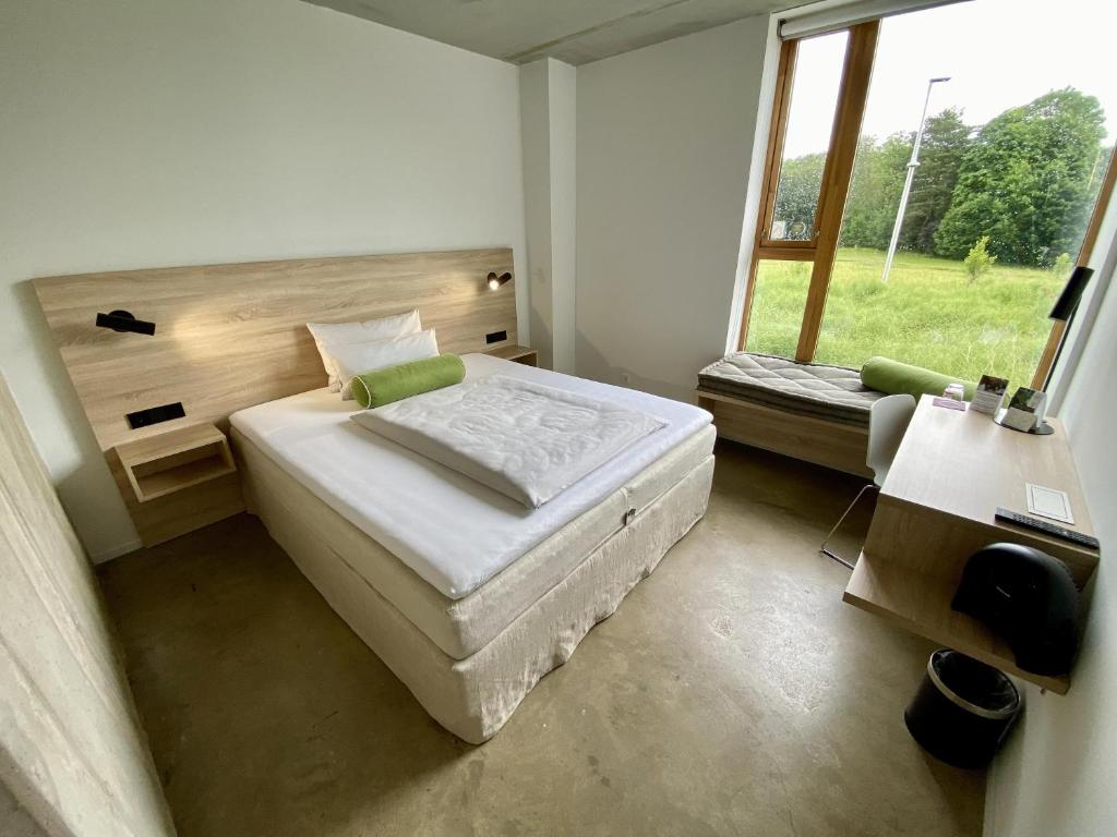 Postel nebo postele na pokoji v ubytování Avaneo Hotel Marktredwitz