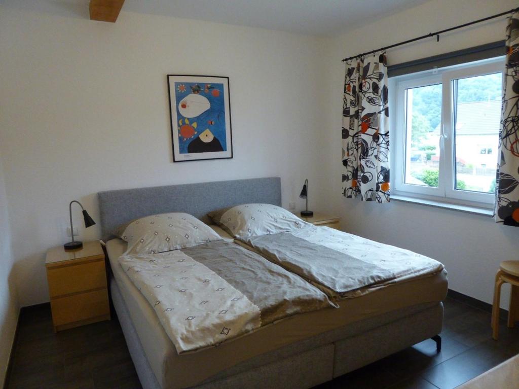 Postel nebo postele na pokoji v ubytování Werners Ferienwohnung
