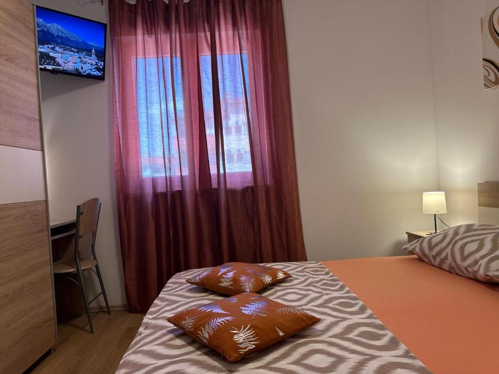 Postel nebo postele na pokoji v ubytování Apartments BRIST HILLS