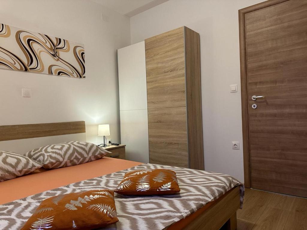 Postel nebo postele na pokoji v ubytování Apartments BRIST HILLS