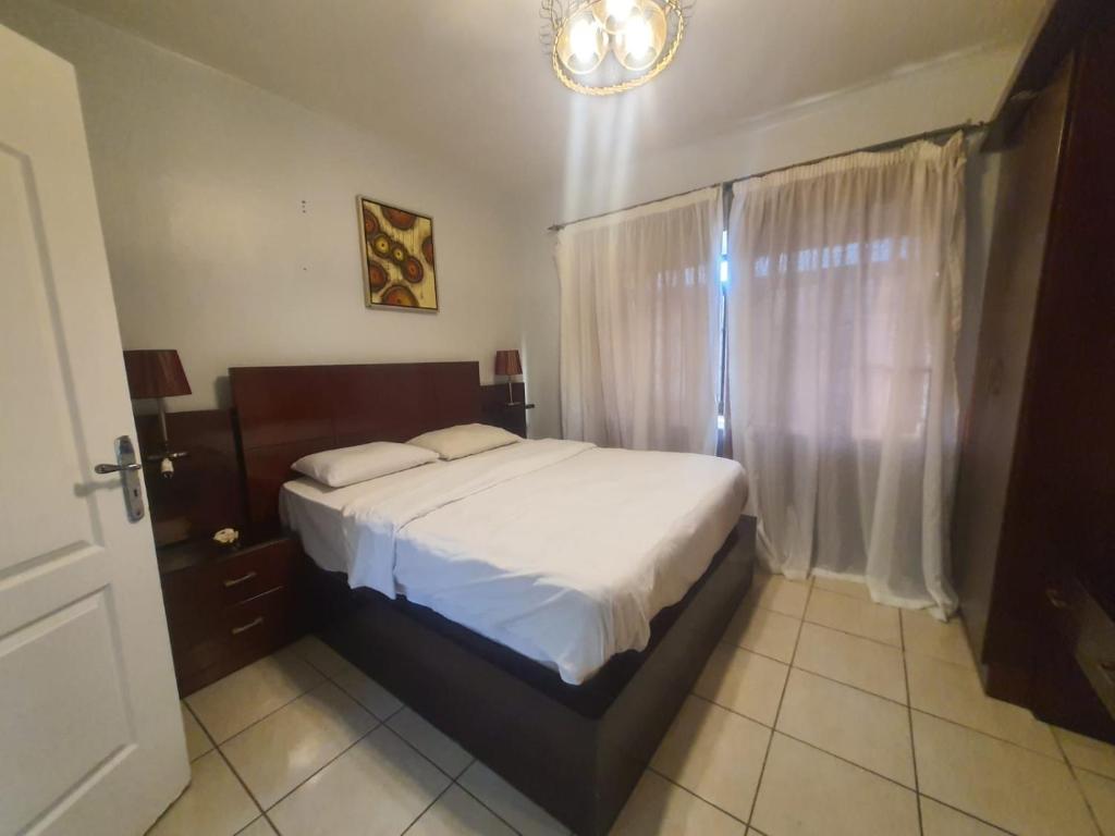 Ένα ή περισσότερα κρεβάτια σε δωμάτιο στο deltasharm resort