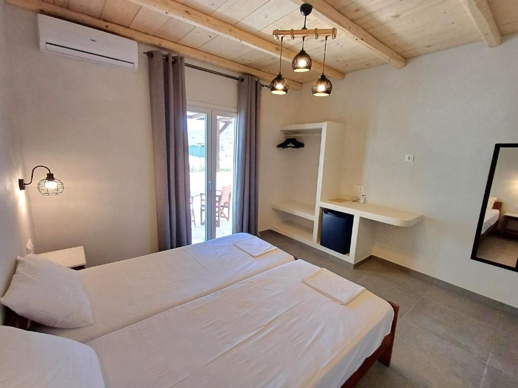 Postel nebo postele na pokoji v ubytování Villa Maria