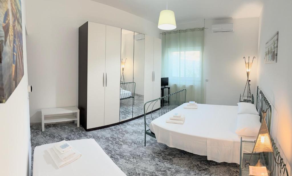 Postel nebo postele na pokoji v ubytování B&B Civico 42