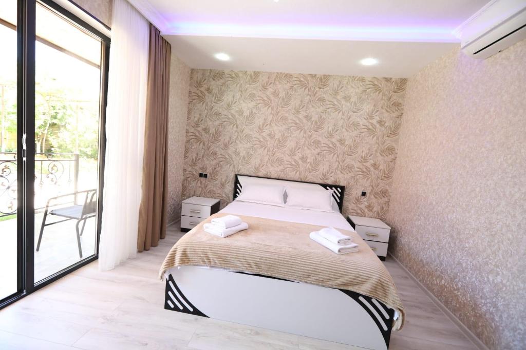 Postel nebo postele na pokoji v ubytování Hotel Tsiskari
