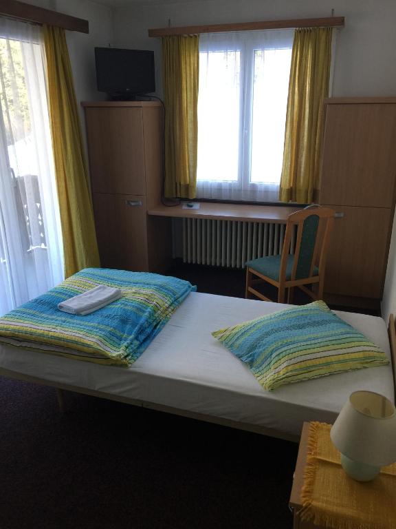 Postel nebo postele na pokoji v ubytování Hotel Waldhof
