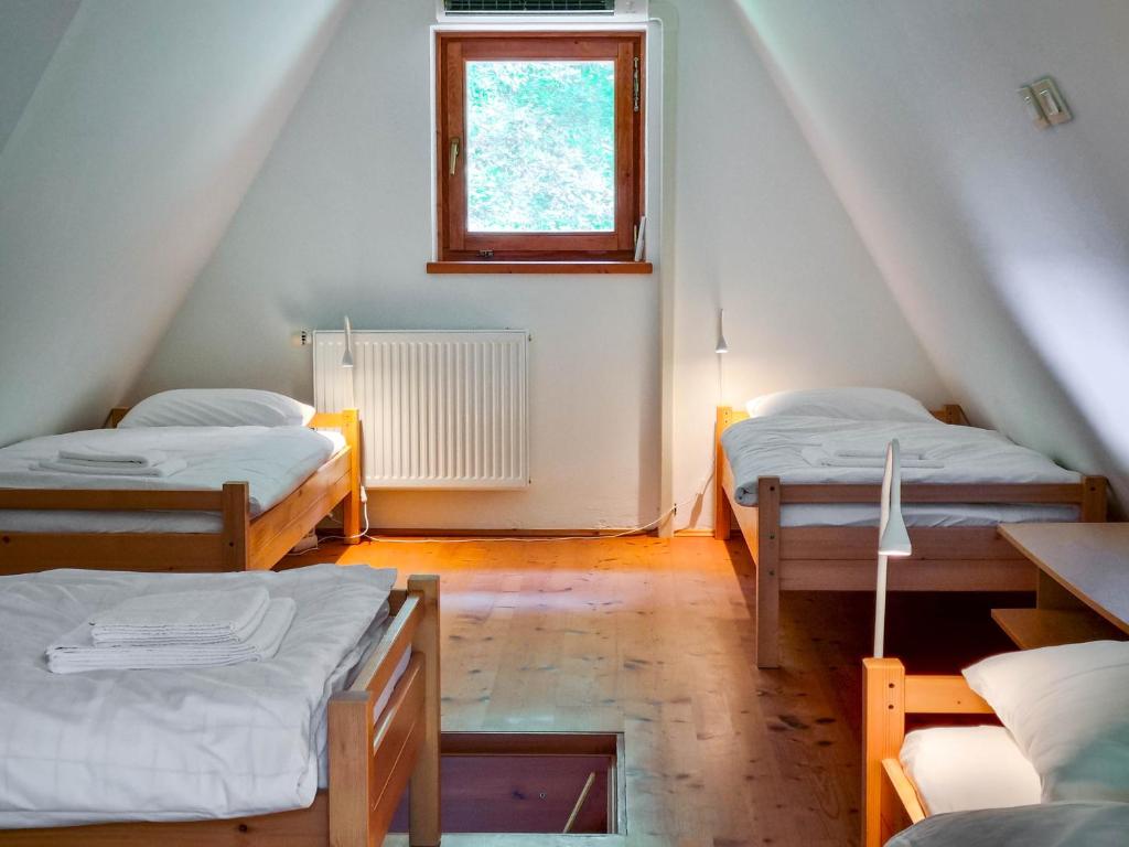 Postel nebo postele na pokoji v ubytování Jakob Cabin