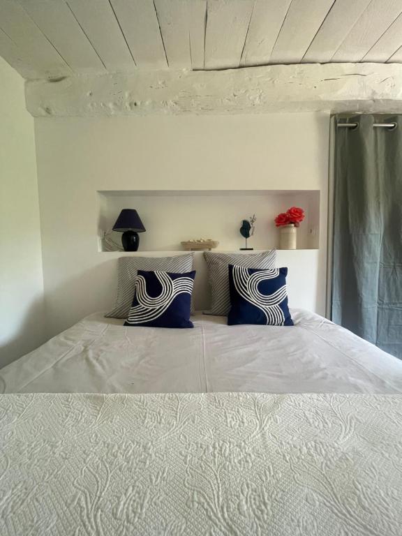 Postel nebo postele na pokoji v ubytování La Maison Armoricaine