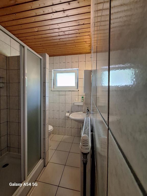 Koupelna v ubytování AlpenKlub Hotel