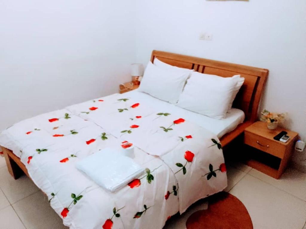 Ένα ή περισσότερα κρεβάτια σε δωμάτιο στο Residence Meublee Les Arcades