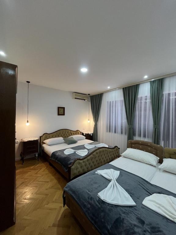 Postel nebo postele na pokoji v ubytování Studio Rooms Moncherie