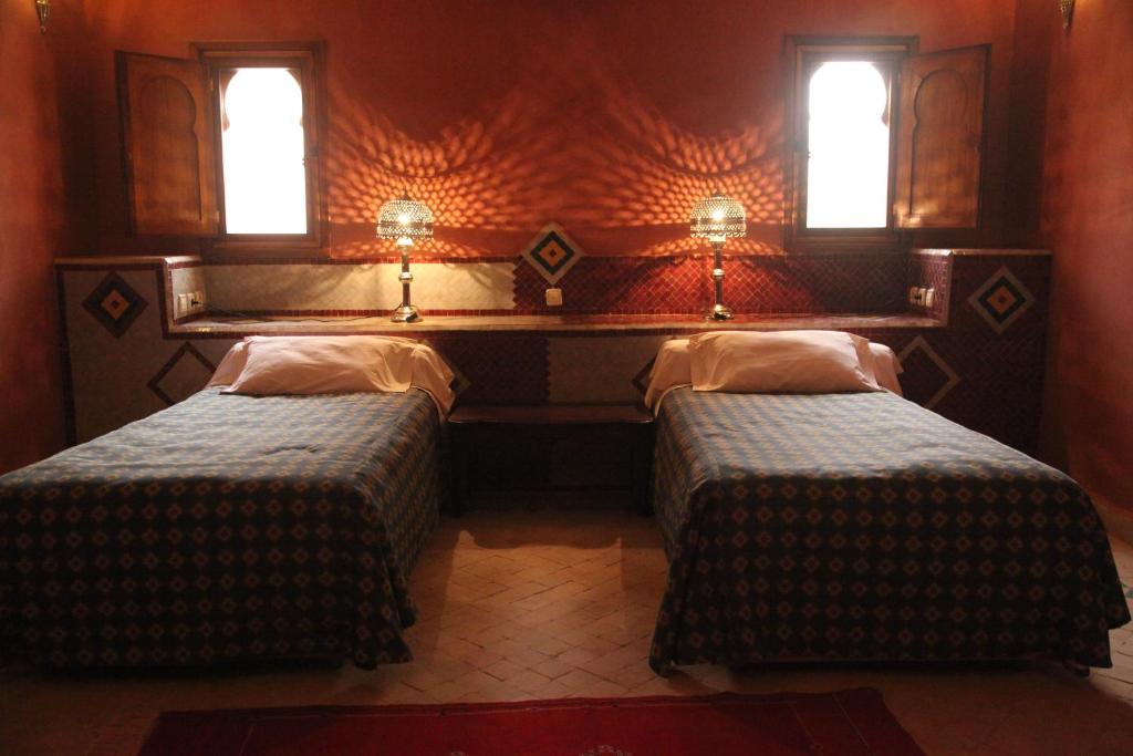 Letto o letti in una camera di Hotel Kasbah Azalay
