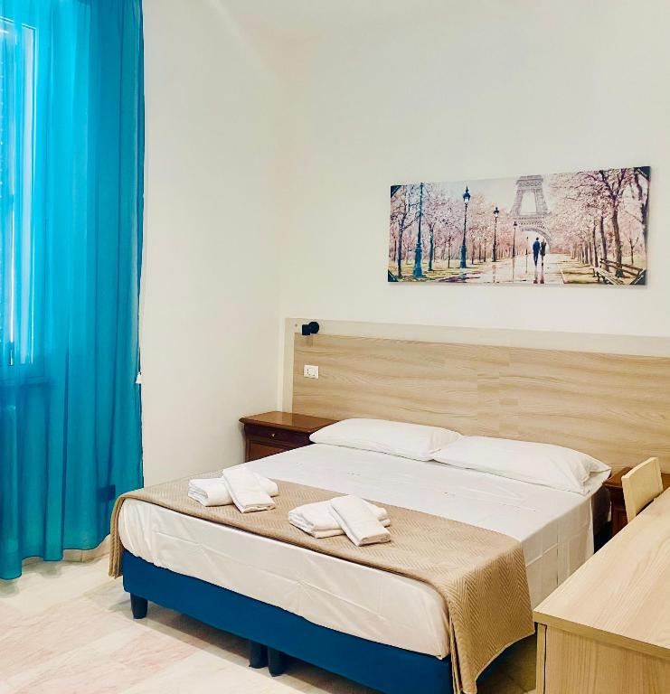 Łóżko lub łóżka w pokoju w obiekcie Tawhid Accomodation