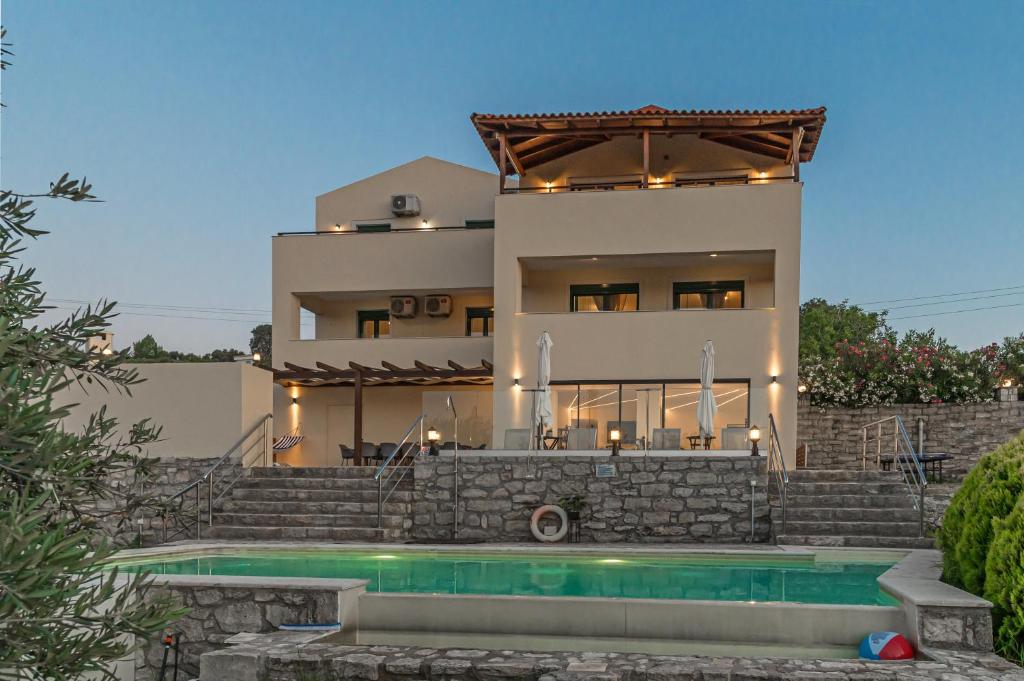 The swimming pool at or close to Elarchon Villa Private Pool