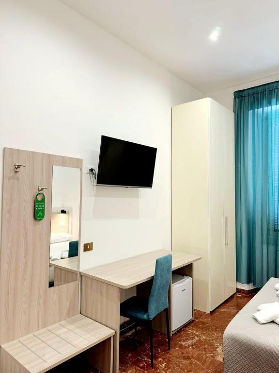 Telewizja i/lub zestaw kina domowego w obiekcie Tawhid Accomodation
