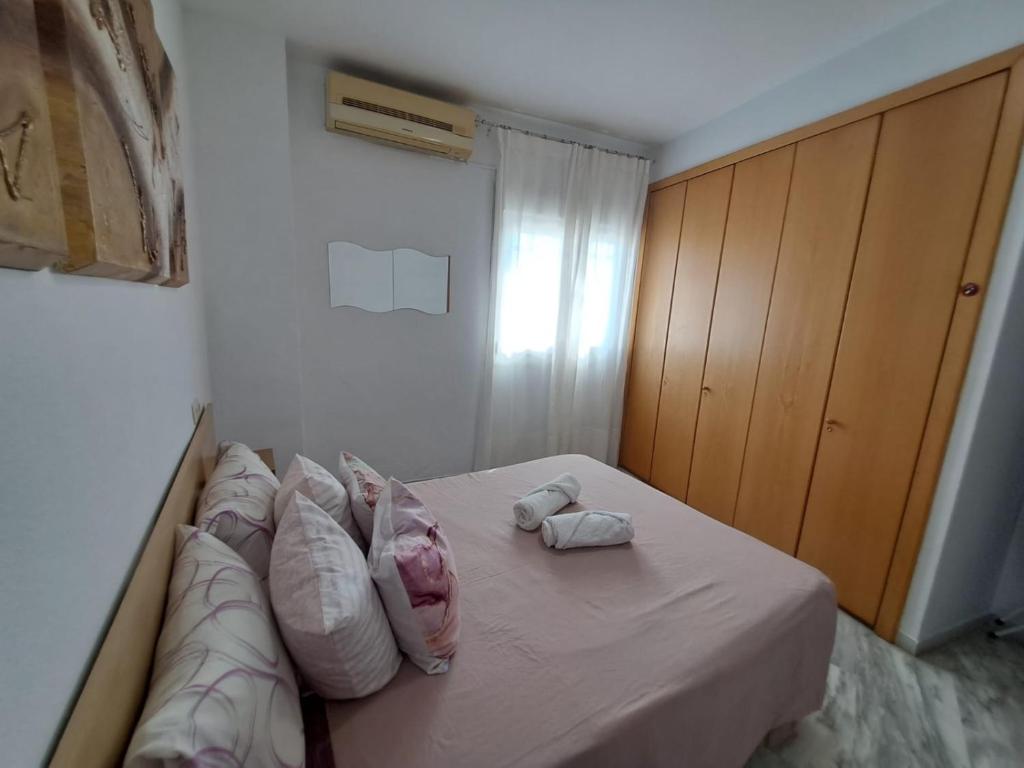 Posteľ alebo postele v izbe v ubytovaní Apartamento Azahar Fibes con garaje gratis